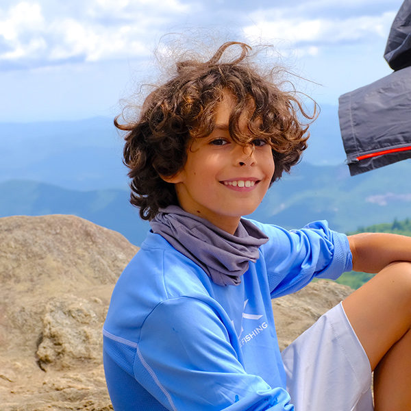 smiling camper at coed summer camp